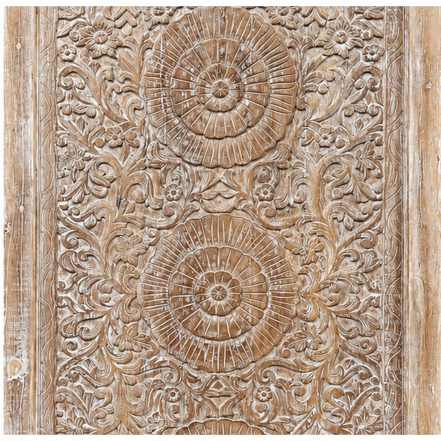 A breathtaking vintage entry door featuring an intricately hand-carved mandala and lotus motif, finished in a soft...
