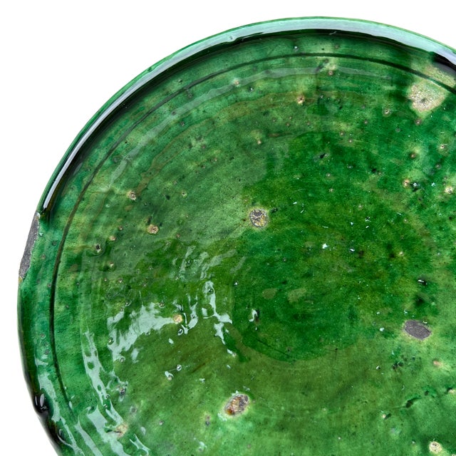 Handcrafted in southern Morocco, Tamegroute pottery is celebrated for its distinctive green glaze, organic forms, and...
