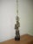 Midcentury ICON. This fabulous weathered brass sculptural brutalist lamp on a black round base first appeared in the...
