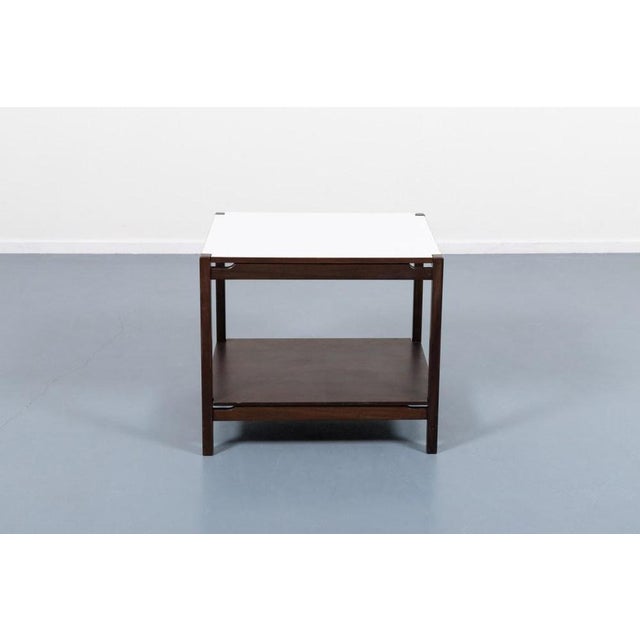 Beautiful Vintage Italian side table/coffee table from Hirozi Fukuoh for Gavina. Executed in varnished walnut, equipped...