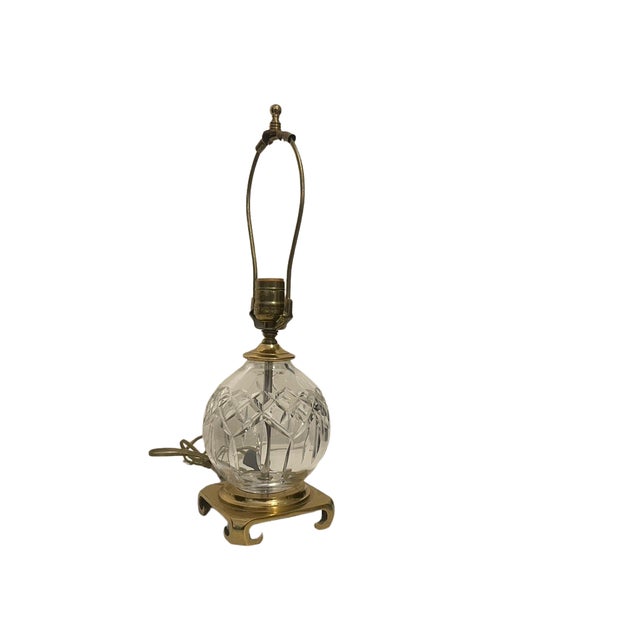 This exceptional vintage mid-century table lamp features a heavy, brilliant-cut lead crystal spherical orb in Waterford’s...