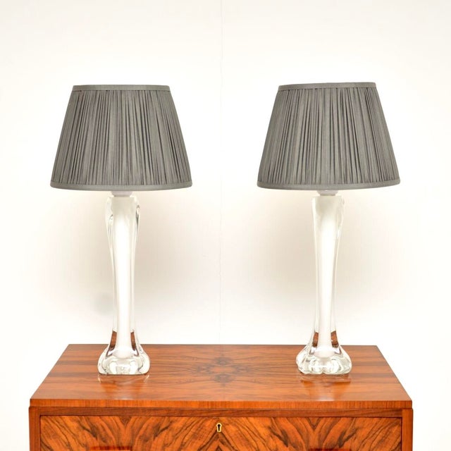 A stunning pair of vintage Swedish glass table lamps by Paul Kedelv for Flygsfors, dating from the 1960’s. The quality is...