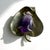 This lovely vintage piece is made of sterling silver in a leaf shape, and set with a large, polished amethyst stone. It...
