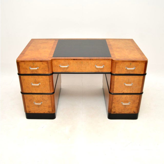A magnificent Art Deco burr walnut pedestal desk. This was made in England, it dates from around the 1920-30’s. The...