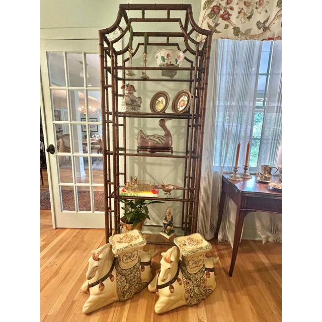 Classic chinoiserie, this etagere will add to your decor and is functional as well. Pagoda style faux bamboo, it features...
