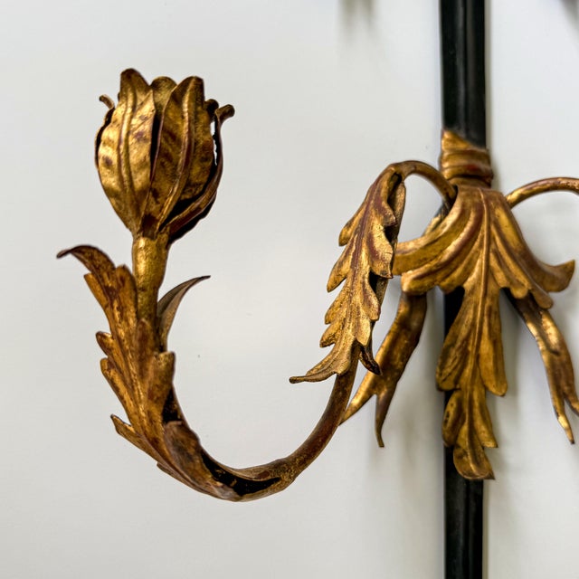 Make a dramatic statement with this striking Hollywood Regency sword-form wall sconce crafted from hand-forged black iron...