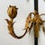 Make a dramatic statement with this striking Hollywood Regency sword-form wall sconce crafted from hand-forged black iron...