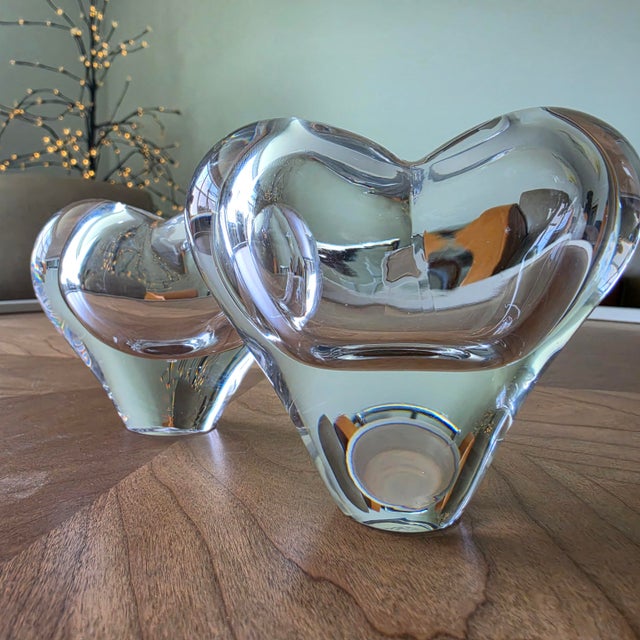 Elevate your tablescape or desk with this striking pair of 1970s Rosenthal Studio-Linie heavy crystal heart sculptures by...