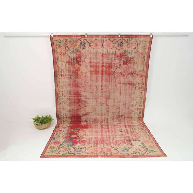 Vintage Hand-Knotted runner rug is a semi-antique vintage area rug. The '70s Eastern region of Anatolia's unique rug is...