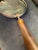 Extra large magnifying glass with horn handle. Brass finish over metal accents terminating at the edge of the handle with...