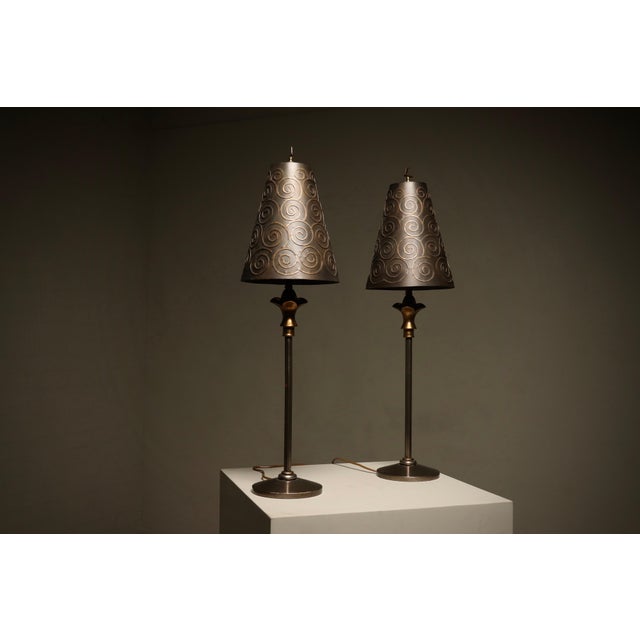 A pair of table lamps designed by Lam Lee for Leeazanne in the 1990s. The pair showcases the designer’s signature balance...