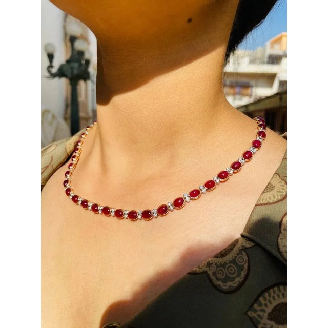 Certified 17 Carat Ruby and Diamond in 18K Gold studded with oval cut ruby. This stunning piece of jewelry instantly...