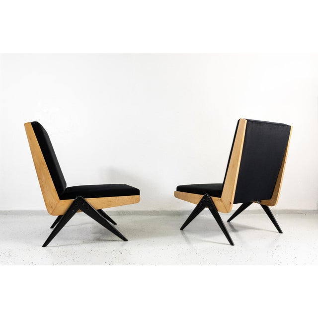 A pair of vintage armchairs from the Type 1312 set, manufactured by Słupskie Fabryki Mebli in the 1960s, Poland. Designed...