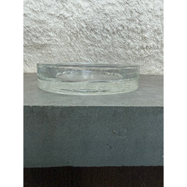 Heavy molded glass minimalist ashtray/catchall. The piece is not marked.
