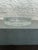 Heavy molded glass minimalist ashtray/catchall. The piece is not marked.