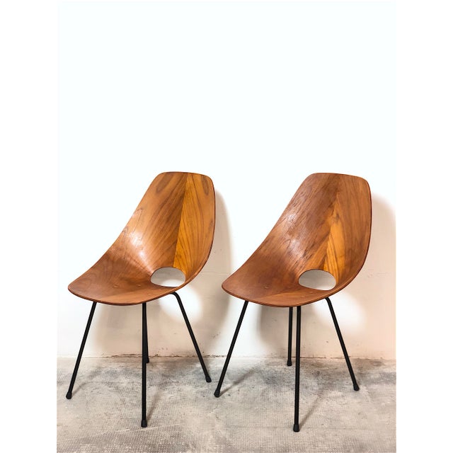 Vintage 1950s Chairs Designed by Vittorio Nobili. This pair of chairs is Italian-made and was created in the 1950s based...
