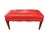Add a bold pop of color with this vintage upholstered bench featuring a warm walnut frame and vibrant red vinyl cushion....