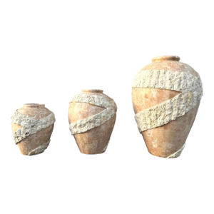 Set of Three Large Postmodern Tasselated Mactan Stone Floor Vases. Circa 1980s