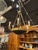 The Late 19th c. French Empire Bronze Chandelier is a stunning and elegant ceiling fixture . Featuring ornate detailing...