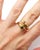 Wempe sapphire ruby snake ring in 18 karat gold. Vintage ring adorned with two snake heads forming a Toi et Moi, set with...