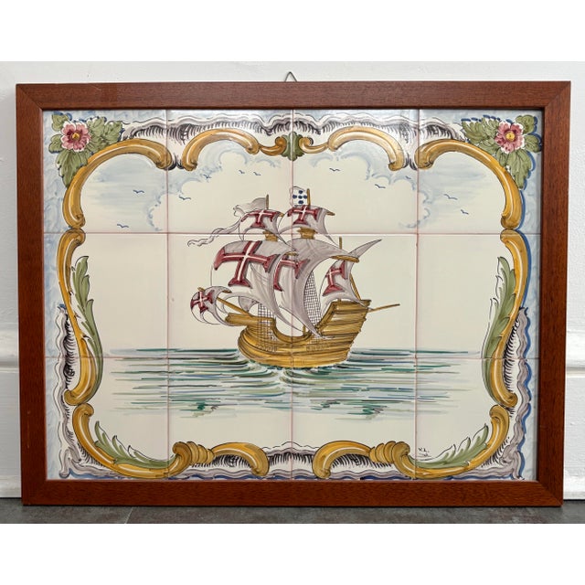 Hand painted Italian Delft inspired clipper ship painting on tile. Mounted to board and framed. Please see condition...
