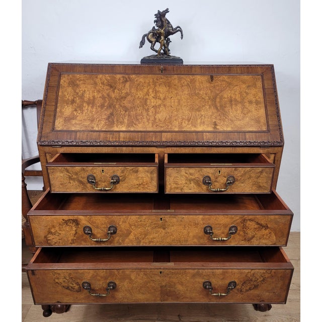 This is a stunning Edwardian quality burr walnut writing bureau desk, with timeless period carved finishes. Circa 1910. A...