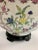 Large exquisite Chinese bowl on stand with handpainted floral decoration. Hallmarked on underside.