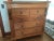 Sweet, but substantial chest of drawers with lovely rosettes as knobs. Interior is lined with some type of muslin or...