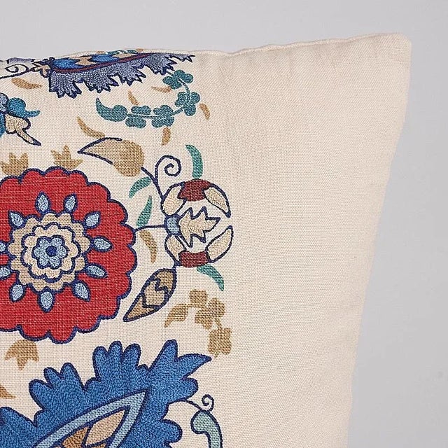 This pillow features Anatolia Embroidery with a knife edge finish. Anatolia Embroidery in blue-and-red features an elegant...