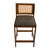 This oak cane back bar counter stool offers a timeless blend of classic craftsmanship and understated elegance. The warm-...