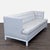 This Jonathan Adler 3-seat sofa features a clean, modern design with light grey upholstery and button tufting on the...