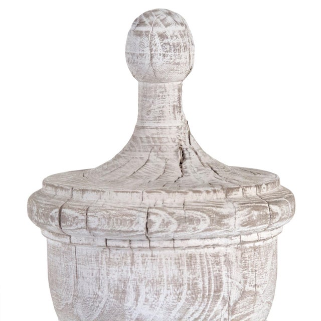 The Amora Urn from Zentique is an elm wood urn with a turned form and natural grain. The 16.5" height adds organic warmth....