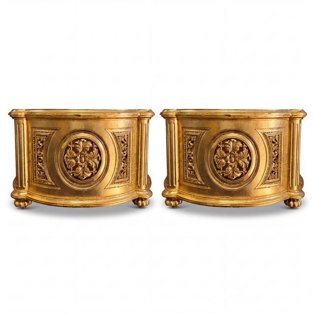 This is a pair of monumental French neoclassical style carved giltwood orangery planters attributed to Christopher Guy....