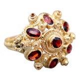 Gold Ring with Reliefs and Seven Encrusted Stones For Sale