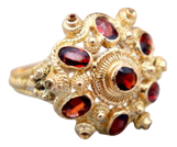 Gold Ring with Reliefs and Seven Encrusted Stones