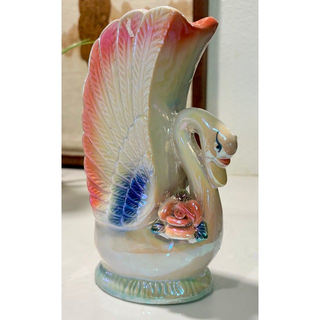 This vintage lusterware vase in the shape of a swimming swan features a highly stylized fan-shaped backing mimicking up...