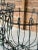 Pair of Antique French Wrought Iron Garden Urn Planters With Grapevine Motif For Sale - Image 10 of 12