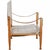 Kaare Klint Safari chair upholstered with canvas fabric, and with a frame of ash and armrests of natural leather. The...