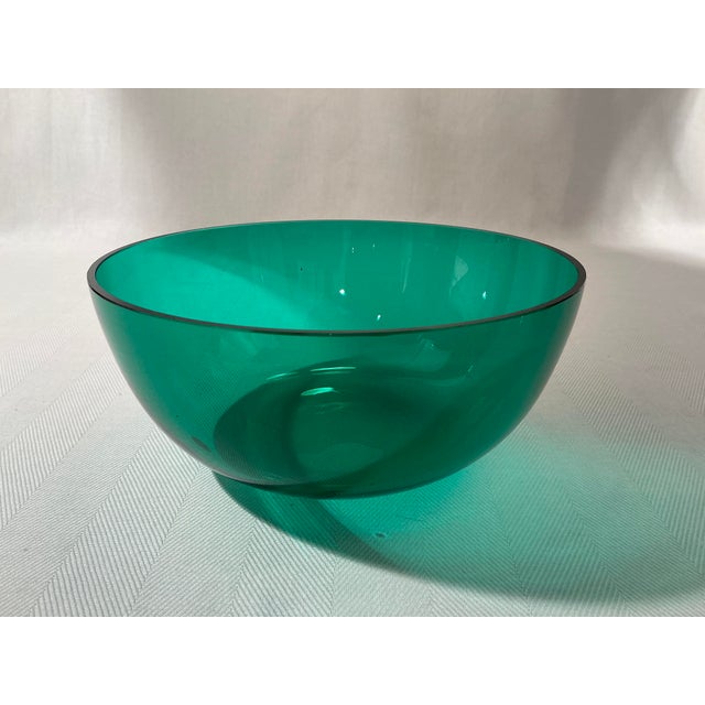 The Reijmyre bowl is a striking piece with a simple, yet elegant design. The deep emerald green color gives it a rich and...