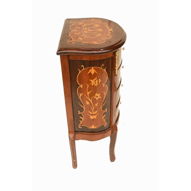 Charming pair of french louis xv style bedside chests beautifully decorated with intricate floral marquetry the shaped...