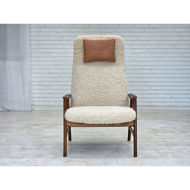 1960s, Danish design by Alf Svensson. Completely renovated/reupholstered high-backed armchair with tilt function. Quality...