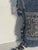Silver silk embroidery on dark blue velvet pillow with side blue crystals beaded fringes.
