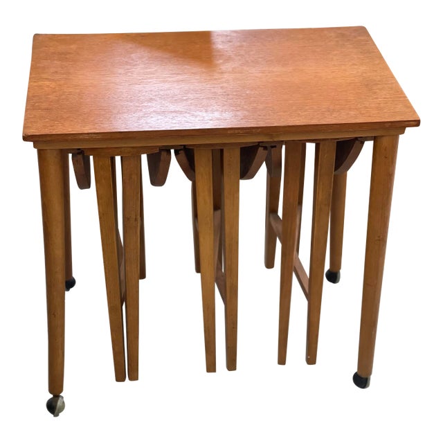1970s Vintage Mid Century Modern Nesting Tables on Casters Uk Import, Offered 1 Nesting Table Set of 4 as Pictured. For Sale