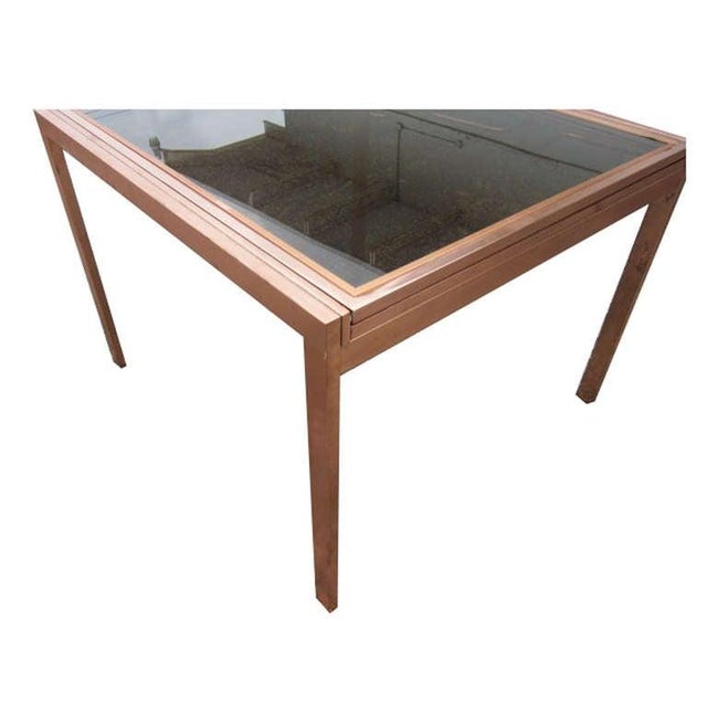 Vintage Milo Baughman Style Extension Dining Table Circa 1970s Rectangular copper & smoked glass dining table in the style...