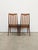 Pair of authentic vintage mid century modern dining chairs. In teak and afrormosia (aka African teak) woods. Designed by...