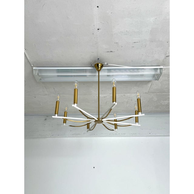 Brass Ceiling Light, 1960s–70s Elegant and eye-catching brass ceiling light from the 1960s–70s. Features eight light...