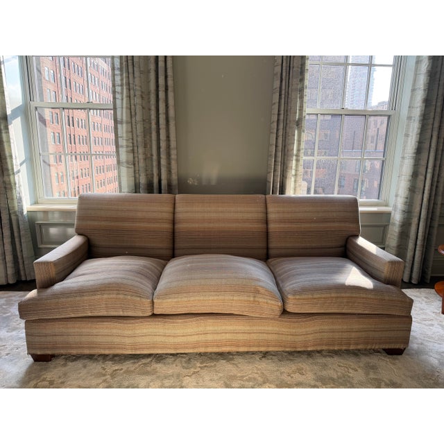 This sofa offers a contemporary design with both comfort and craftsmanship in mind and is suitable for a traditional or...