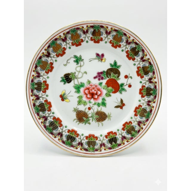 A beautiful, cohesive set of four mid-to-late 20th-century Chinese export porcelain dessert or sandwich plates crafted in...