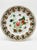 A beautiful, cohesive set of four mid-to-late 20th-century Chinese export porcelain dessert or sandwich plates crafted in...