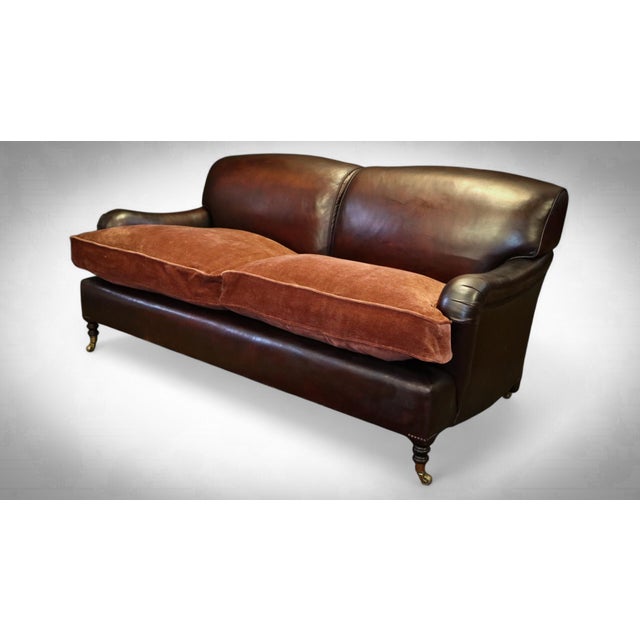 Up for grabs here is a stunning george smith standard signature 2 seater sofa in deep burgundy leather and salmon florence...
